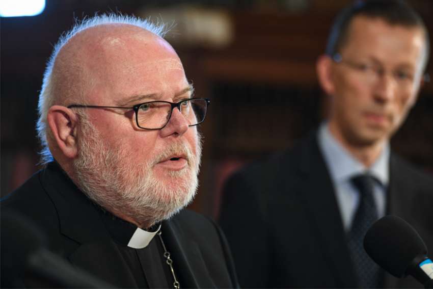 Cardinal Reinhard Marx of Munich and Freising, president of the German bishops&#039; conference, speaks to the press at the beginning of the German bishops&#039; fall assembly in Fulda, Germany, Sept. 24, 2018. Also pictured is Matthias Kopp, spokesman for the conference.
