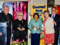 Cardinal Thomas Collins and Catholic Charities executive director Michael Fullan honour, from left, Marion Barszczyk, Desire Paiva and Jo-Anne Sheehy for their combined 77 years of service.