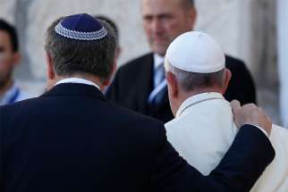 Rabbi Abraham Skorka of Buenos Aires and Pope Francis embrace after visiting the Western Wall in Jerusalem May 26, 2014.