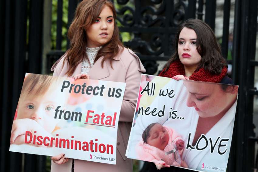 Pro-life supporters stand with signs outside the High Court in Belfast, Northern Ireland, Jan. 30, 2019. Britain&#039;s bishops have made the right to life a priority for Catholics ahead of a general election in which two major political parties have promised to liberalize abortion laws.