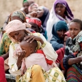 Internally displaced Somali women and children wait at a camp in the capital Mogadishu July 20.