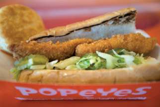 Popeyes scores big with our would-be foodwriter for its Cajun fish sandwich. 