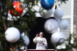 Pope Francis waves during his Angelus in St. Peter&#039;s Square at the Vatican Dec. 3. Advent is a time to be watchful and alert to the ways one strays from God&#039;s path, but also to signs of his presence in other people and in the beauty of the world, Pope Francis said.