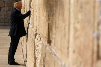 .S. President Donald Trump places a note in the Western Wall in Jerusalem May 22. Following reports that Trump planned to recognize Jerusalem as the capital of Israel, Pope Francis expressed his concern that such a move would further destabilize the Middle East. 