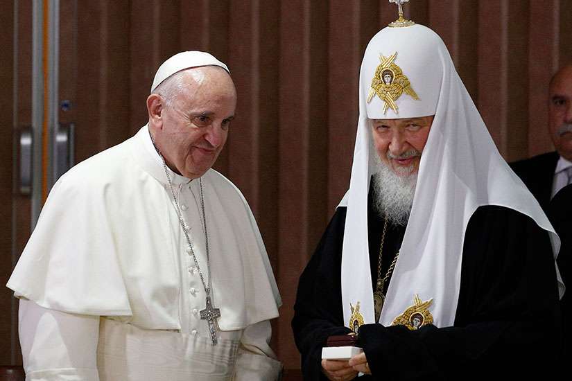 Pope Francis presents gifts to Russian Orthodox Patriarch Kirill of Moscow after the leaders signed a joint declaration during a meeting at Jose Marti International Airport in Havana Feb. 12. 