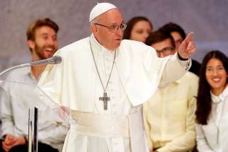 Pope Francis speaks during a gathering with young people and members of the Synod of Bishops at the Vatican Oct. 6.