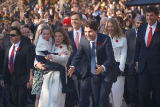 Prime Minister Justin Trudeau, his wife Sophie Gregoire Trudeau and his new cabinet took a bus to Rideau Hall and walked up to the Governor General&#039;s residence for their swearing in. Hundreds lined the road to greet the new government. 