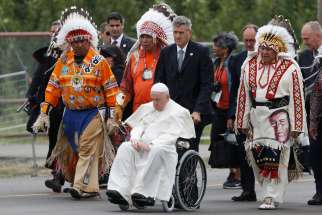 Pope Francis arrives with Indigenous leaders for a meeting with First Nations, Métis and Inuit communities at Maskwacis, Alberta, July 25, 2022.