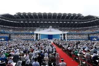 Pope Francis celebrates Mass on the feast of the Assumption in World Cup Stadium in Daejeon, South Korea, Aug. 15.