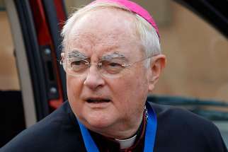 Archbishop Henryk Hoser of Warsaw-Praga, Poland, arrives for the morning session of the Synod of Bishops on the familyin 2015 at the Vatican. Poland&#039; s Catholic Church has reiterated support for stricter abortion controls, after parliamentarians voted down a law that would have sent aborting mothers to jail