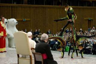 Members of Italy&#039;s Golden Circus perform for Pope Francis during his general audience in Paul VI hall at the Vatican Dec. 27.