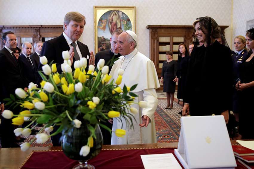 Pope Francis talks with King Willem-Alexander and Queen Maxima of the Netherlands during a private meeting at the Vatican June 22.
