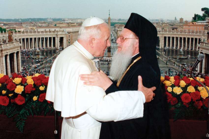 St. Pope John Paul II and Ecumenical Patriarch Bartholomew of Constantinople embrace following three days of private meetings at the Vatican in 1995.