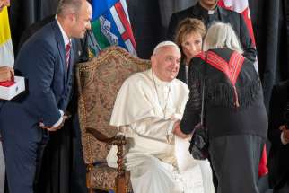 Pope Francis greets residential school survivors, Indigenous leaders and elders, civic leaders, and church officials after landing at Edmonton International Airport, July 24, 2022.