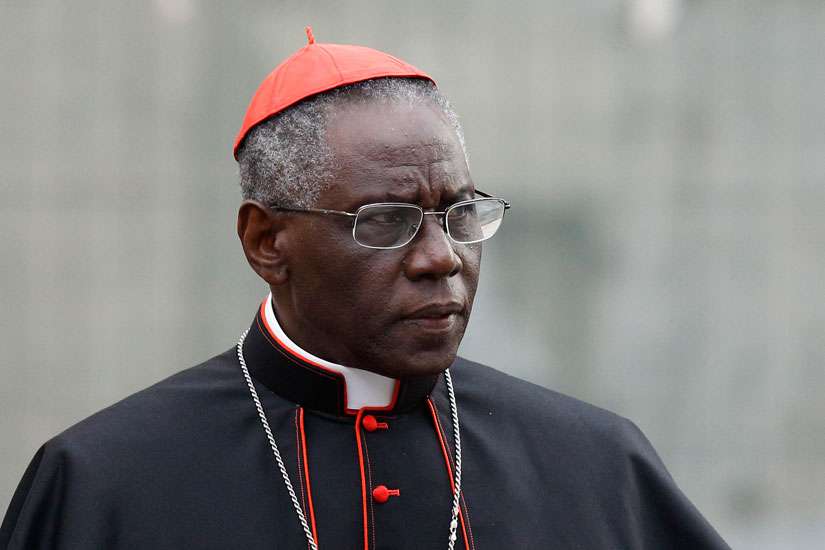 Cardinal Robert Sarah, prefect of the Congregation for Divine Worship and the Sacraments, is pictured at the Vatican in this Oct. 9, 2012, file photo. Cardinal Sarah, the Vatican&#039;s liturgy chief, has asked priests to begin celebrating the Eucharist facing east, the same direction the congregation faces.