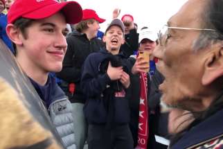 Nick Sandmann, a junior at Covington Catholic High School in Park Hills, Ky., and others students from the school stand in front of Native American Nathan Phillips near the Lincoln Memorial in Washington in this still image from video Jan. 18, 2019. A federal judge July 26 dismissed a $250 million lawsuit against The Washington Post by Sandmann saying the newspaper&#039;s articles and tweets about the student&#039;s actions during the annual March for Life in January were protected by the First Amendment.