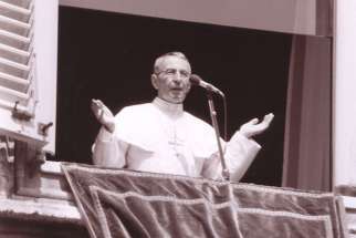 An undated photo of Pope John Paul I speaking at the window of his private studio. 