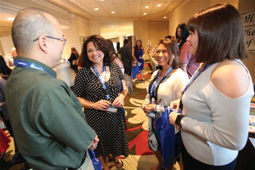A group of Catholic singles mingle at a U.S. National Catholic Singles Conference.