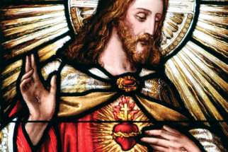 The Sacred Heart of Jesus in a stained-glass window.