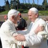 ope Francis, right, embraces retired Pope Benedict XVI during a ceremony in the Vatican gardens July 5. During the service, Pope Francis blessed a new statue of St. Michael the Archangel and recited separate prayers to consecrate Vatican City to St. Jo seph and to St. Michael.
