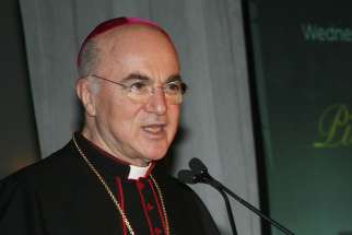 Archbishop Carlo Maria Vigano, former apostolic nuncio to the United States, speaks at a dinner honoring then-Cardinal Theodore E. McCarrick of Washington in May 2012. Archbishop Vigano said in an Aug. 26 letter that now-Archbishop McCarrick was under sanctions imposed by Pope Benedict XVI in 2009 or 2010 in connection with allegations of sexual abuse against the former Washington archbishop, but that Pope Francis and U.S. church leaders declined to enforce them.