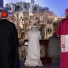 Pope Benedict XVI prays at the Nativity scene in St. Peter&#039;s Square after leading vespers in St. Peter&#039;s Basilica on New Year&#039;s Eve at the Vatican Dec. 31.