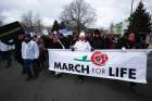 March for Life participants make their way to the U.S. Supreme Court building in Washington Jan. 29 amid the coronavirus pandemic.