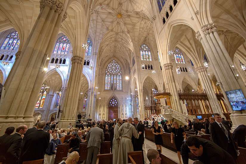People fill the pews before the start of a prayer service led by Pope Francis at St. Patrick&#039;s Cathedral in New York Sept. 24.