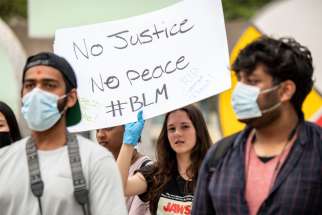 About 300 protesters in Nathan Phillips Square June 5 put forward their message without violence.