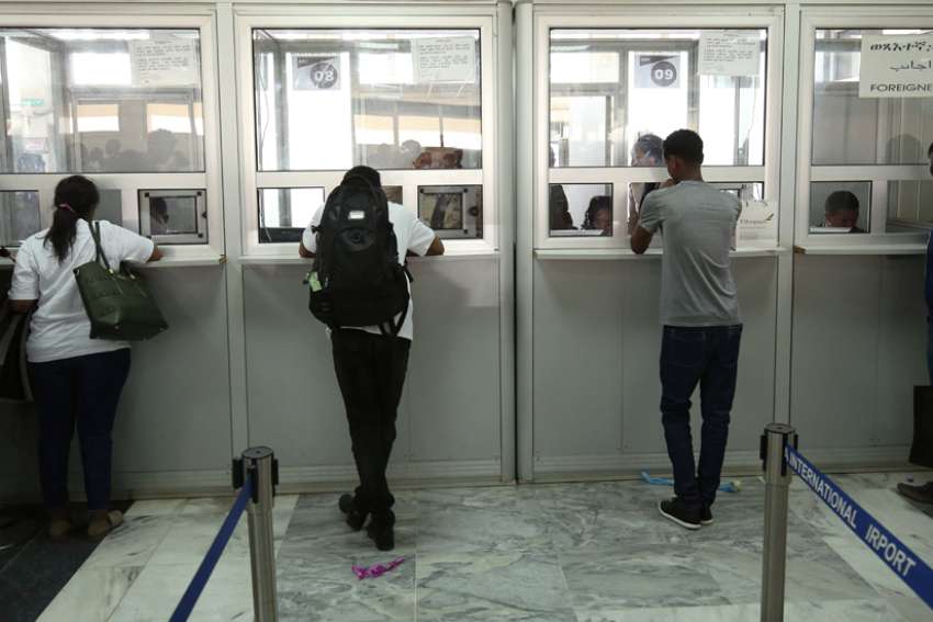 Passengers are processed at the immigration section after arriving at Asmara International Airport in Asmara, Eritrea, July 18, 2018. Eritrean authorities are continuing to detain Catholic Bishop Fikremariam Hagos Tsalim of Segheneity, who was arrested at the airport Oct. 15, 2022.