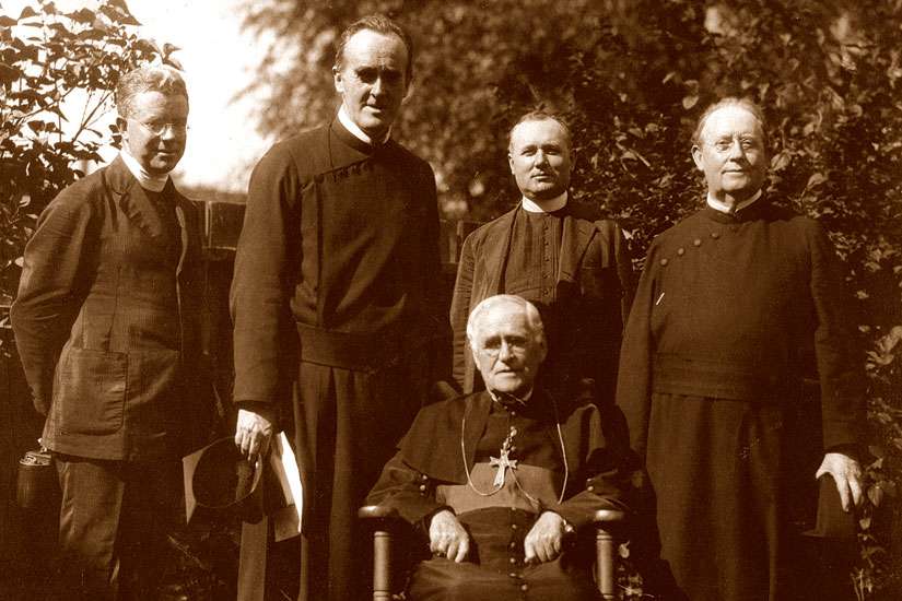 In 1913, Archbishop Neil McNeil (seated) invited Paulist Father Thomas Burke, second from the left, to Toronto to minister to the University of Toronto’s 250 Catholic students. Burke set up U of T’s Newman Centre. After a century in Toronto, running St. Peter’s parish, the Paulists are returning to the United States due to declining vocations.