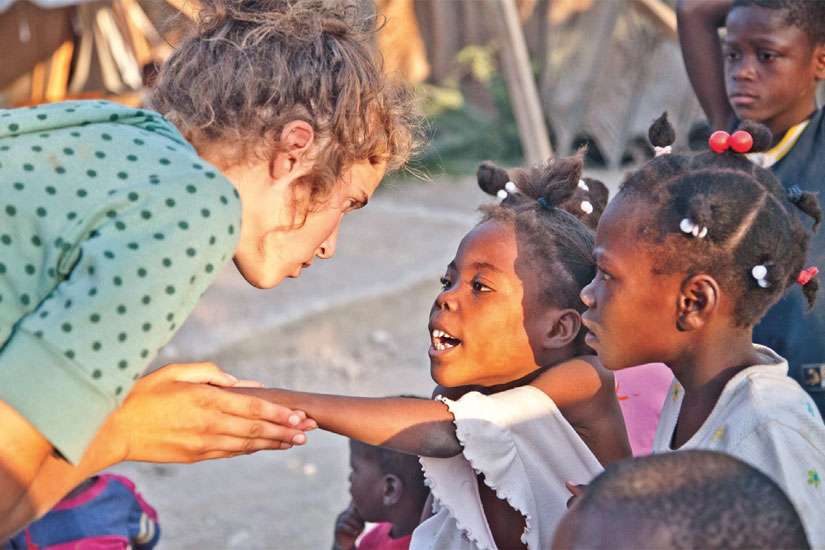 Morgan Wienberg now lives in Haiti full-time, working to give Haitian children the support for a good education and a good home.