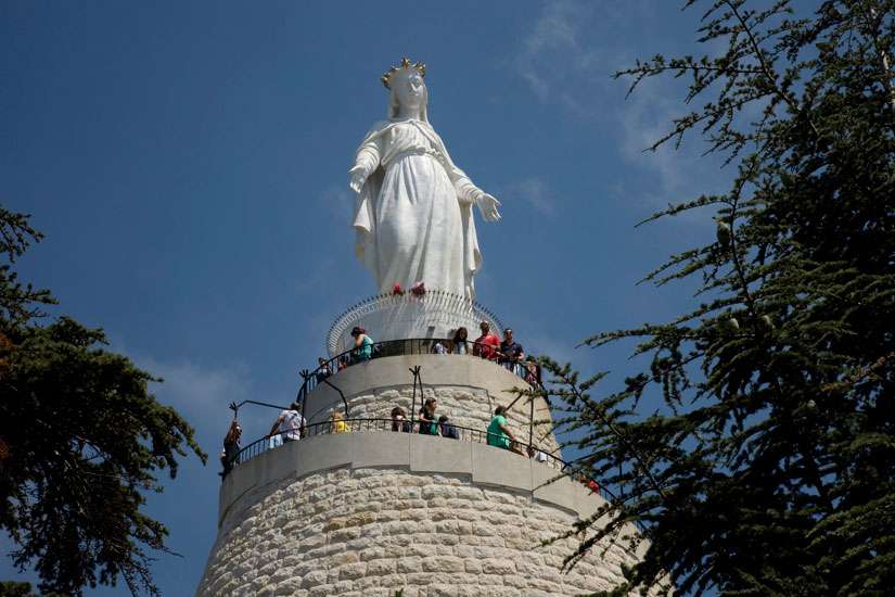 People visit the Shrine of Our Lady of Lebanon in 2012 in the village of Harissa near Beirut. Muslims and Christians alike come to the shrine. 