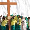 Brazilian pilgrims cheer as Pope Benedict XVI announces that the next World Youth Day will be held in Rio de Janeiro in 2013.