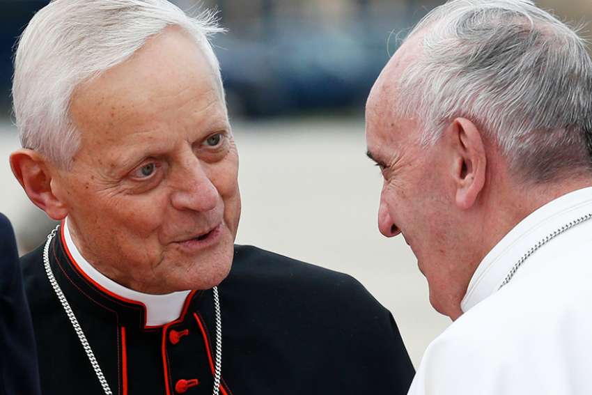 Cardinal Donald W. Wuerl of Washington talks with Pope Francis at Andrews Air Force Base in Maryland near Washington Sept. 22, 2015. Cardinal Wuerl announced Sept. 11 that he will meet soon with the pope to discuss the resignation he submitted three years ago when he turned 75.