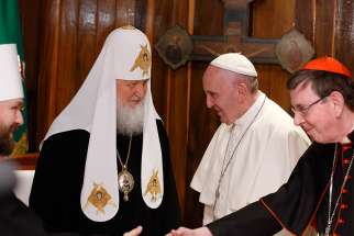 Russian Orthodox Patriarch Kirill of Moscow and Pope Francis meet at Jose Marti International Airport in Havana Feb. 12. Also pictured are Swiss Cardinal Kurt Koch, president of the Pontifical Council for Promoting Christian Unity, right, and an unidentified Russian Orthodox representative. The pope was traveling to Mexico for a six-day pastoral visit. 
