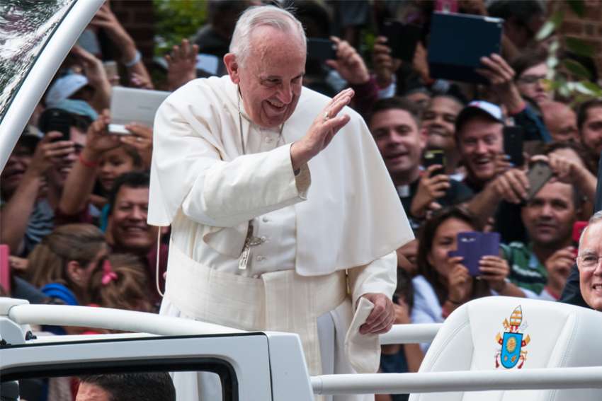 Pope Francis greets crowds from the popemobile at the World Meeting of Families in Philadelphia, 2015.