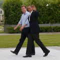 Britain&#039;s Prime Minister David Cameron walks with U.S. President Barack Obama at the Lough Erne golf resort, where the Group of Eight leaders are meeting in Enniskillen, Northern Ireland, June 17.