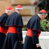 Francis E. George of Chicago, Donald W. Wuerl of Washington and Daniel N. DiNardo of Galveston-Houston, arrive for a general congregation meeting in the synod hall at the Vatican March 5. The world&#039;s cardinals are meeting for several days in advance of the conclave to elect the new pope.