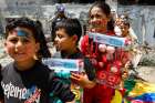 Palestinian children participate in an activity in the central Gaza Strip May 15 aimed to support the mental health of children affected by the recent Israel-Gaza fighting, near the site of an Israeli strike. A ceasefire was agreed to between Palestinian factions and Israel on May 13.