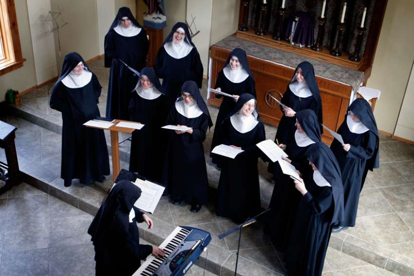The Benedictines of Mary, Queen of Apostles rehearse songs in their new chapel in Gower, Mo., Feb. 17.
