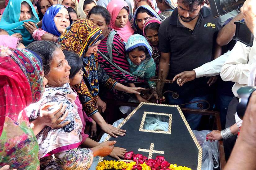 People react over the coffin of a victim March 28 a day after a suicide bomb attack at a park in Lahore, Pakistan. Pope Francis appealed to the government of Pakistan to take steps to ensure the safety of the country&#039;s Christians and other minorities. 