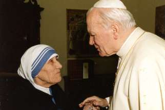 Pope John Paul II greets Mother Teresa at the Vatican in an undated file photo. When Mother Teresa is canonized Sept. 4, she’ll join three other Teresas who are models for today’s Church.