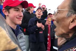 Students from Covington Catholic High School in Park Hills, Ky., stands in front of Native American Vietnam veteran Nathan Phillips Jan. 18 near the Lincoln Memorial in Washington in this still image from video. An exchange between the students and Phillips Jan. 18 was vilified on social media the following day, but the immediate accusations the students showed racist behavior were stepped back as more details of the entire situation emerged. 