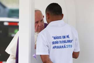 Pope Francis hears confession during a penitential liturgy with juvenile detainees in Las Garzas de Pacora Juvenile Detention Center in Pacora, Panama, Jan. 25, 2019. 