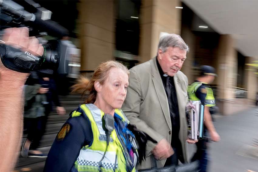 Australian Cardinal George Pell departs the Melbourne Magistrates&#039; Court March 27 in Melbourne. Cardinal Pell appeared in court for the magistrate to hear evidence and decide whether there is a strong enough case to go to trial on sexual abuse charges, which the cardinal has denied.