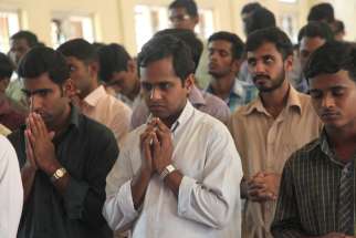 Seminarians are pictured in a file photo praying at St. Joseph Pontifical Seminary of the Syro-Malabar Catholic Church in India&#039;s Kerala state. Lay leaders in the Kochi-based Ernakulam-Angamaly Archdiocese say Archbishop Andrews Thazhath, the apostolic administrator, unilaterally revoked the dispensation that had allowed priests to celebrate Mass facing the people, reported ucanews.com.