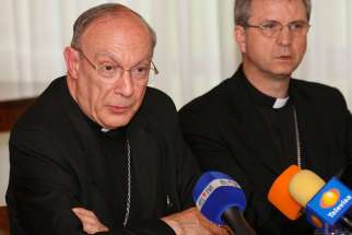Belgium bishops hold a press conference in Rome May 7 following their meeting with Pope Benedict XVI. Bishop Bonny is on the right.