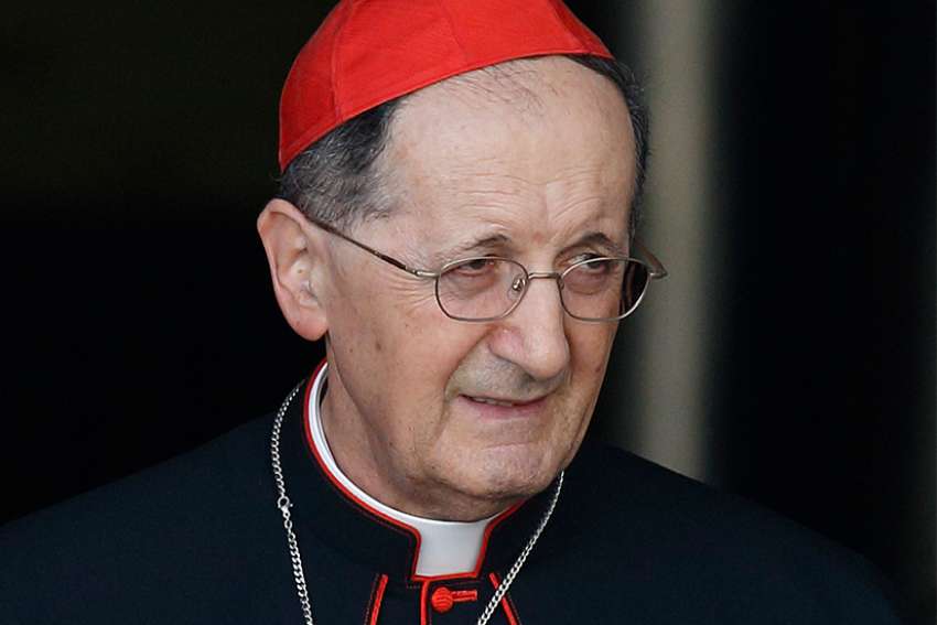  Cardinal Beniamino Stella, prefect of the Congregation for Clergy, leaves the opening session of the extraordinary Synod of Bishops on the family at the Vatican Oct. 6, 2014. Cardinal Stella said the current abuse crisis facing the church would not have been so grave if laity were more involved in the formation of priests. 