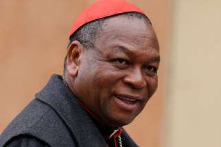 Cardinal John Olorunfemi Onaiyekan of Abuja, Nigeria, is pictured in a 2013 photo at the Vatican.Two bishops from southern Nigeria condemned an attack on a vehicle carrying Cardinal Onaiyekan and appealed to the government to tackle the issue of growing attacks in Edo state.